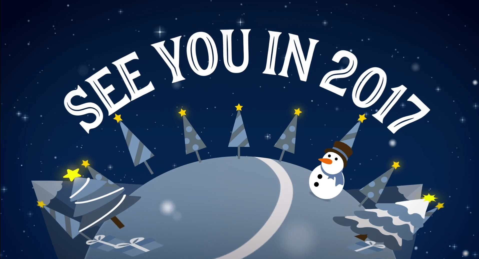 A festive scene with snowy trees, a snowman, and a curved road under a starry night sky. Large text above reads, "SEE YOU IN 2017.