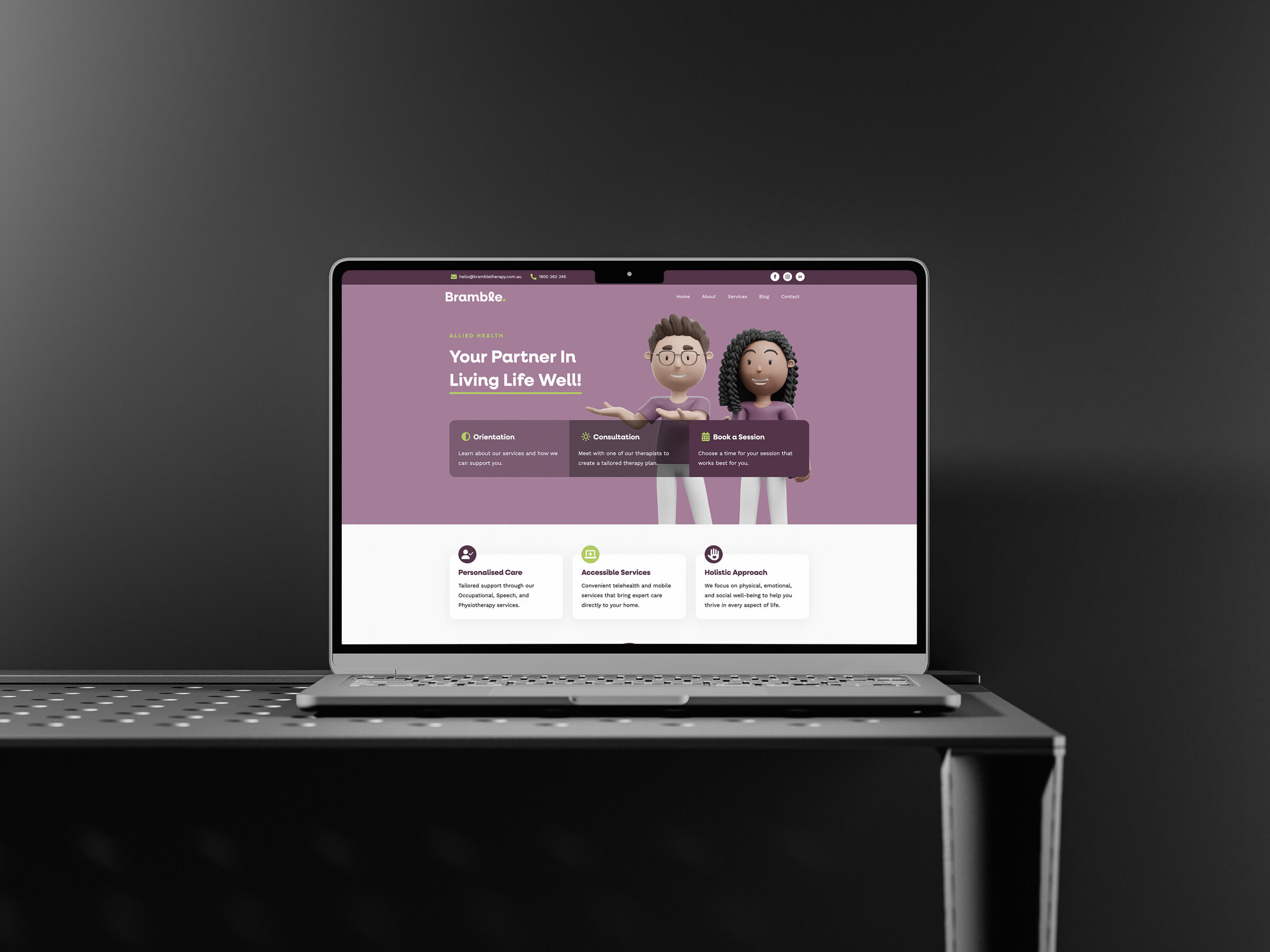 A laptop on a dark metal table displays a website with a purple background, featuring two cartoon characters and dedicated sections for consultation, medication, and mental wellbeing.